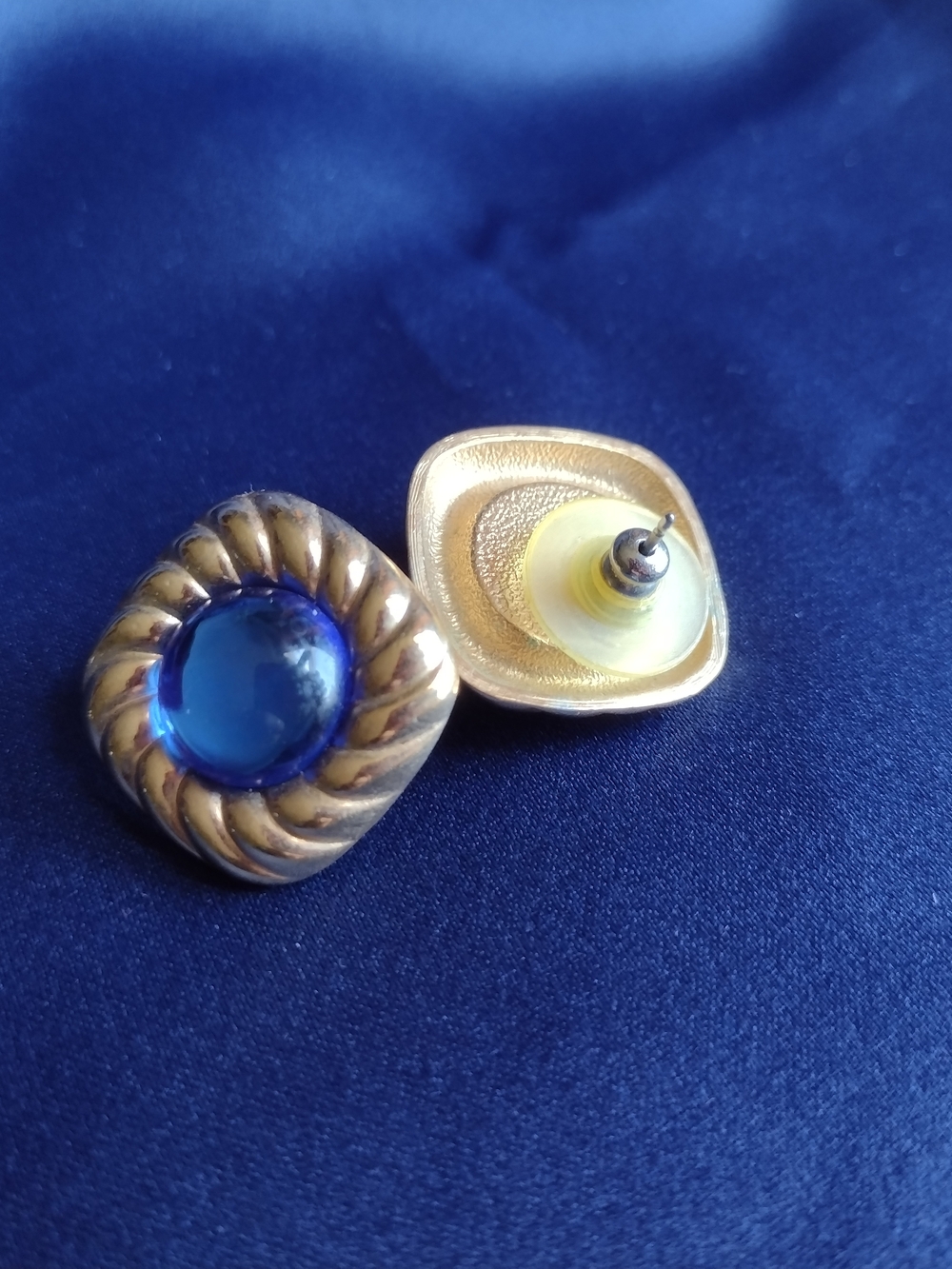 Gold-Tone Earrings with Deep Blue Cabochon Center